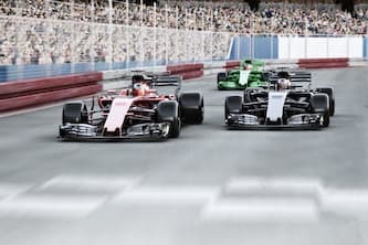 Three Formula One drivers racing